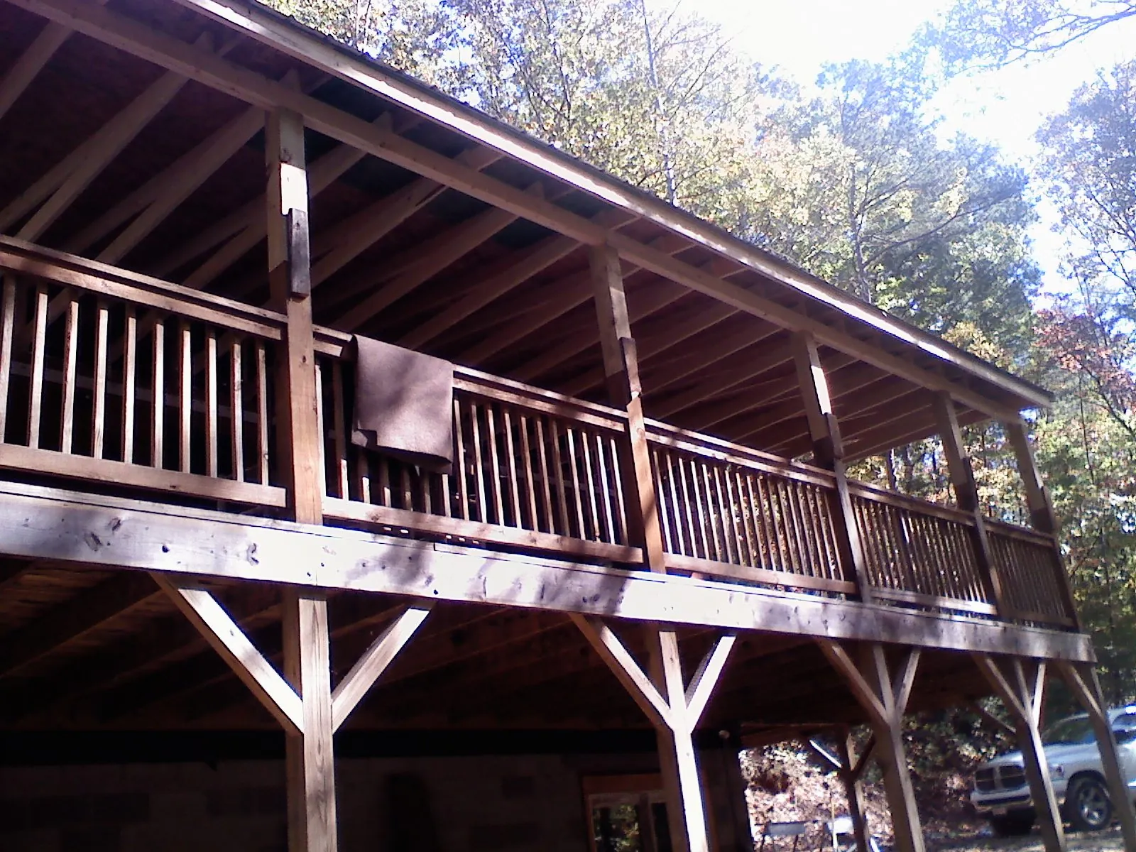 Timber framing under a new elevated porch and deck — Roof Leak Repair in Shirleysburg by Roofing Brothers